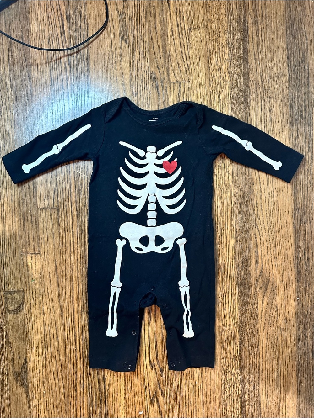 Old Navy Black One-Piece Bodysuit with White Skeleton and Red Heart